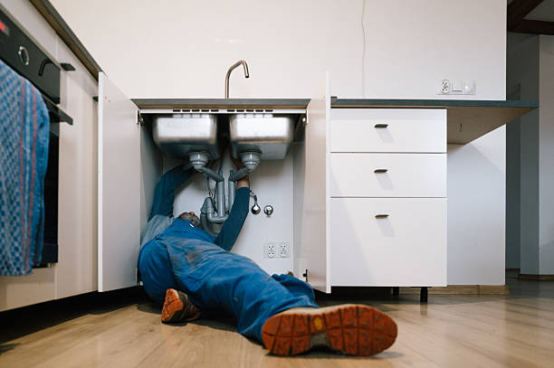 Professional Drain Cleaning technician working in French Village, MO